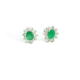 Oval Emerald Diamonds Flower Earring 18K WG 1.27 / D 0.51 / 0.59 / Oval Green Emerald and Round Brilliant Diamond Stud Earrings in White Gold